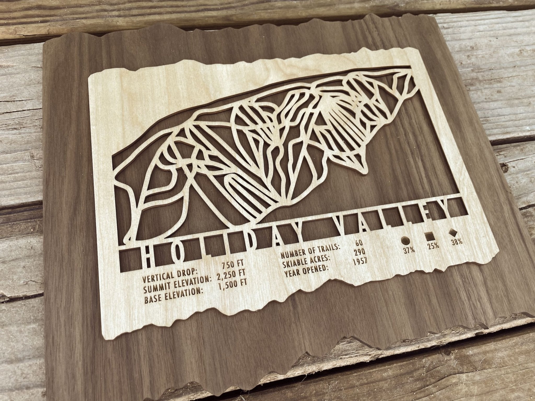 Close-up angled view of Holiday Valley Trail Map - Wall Decor - MountainCut showing detailed ski trail design and engraved resort information.