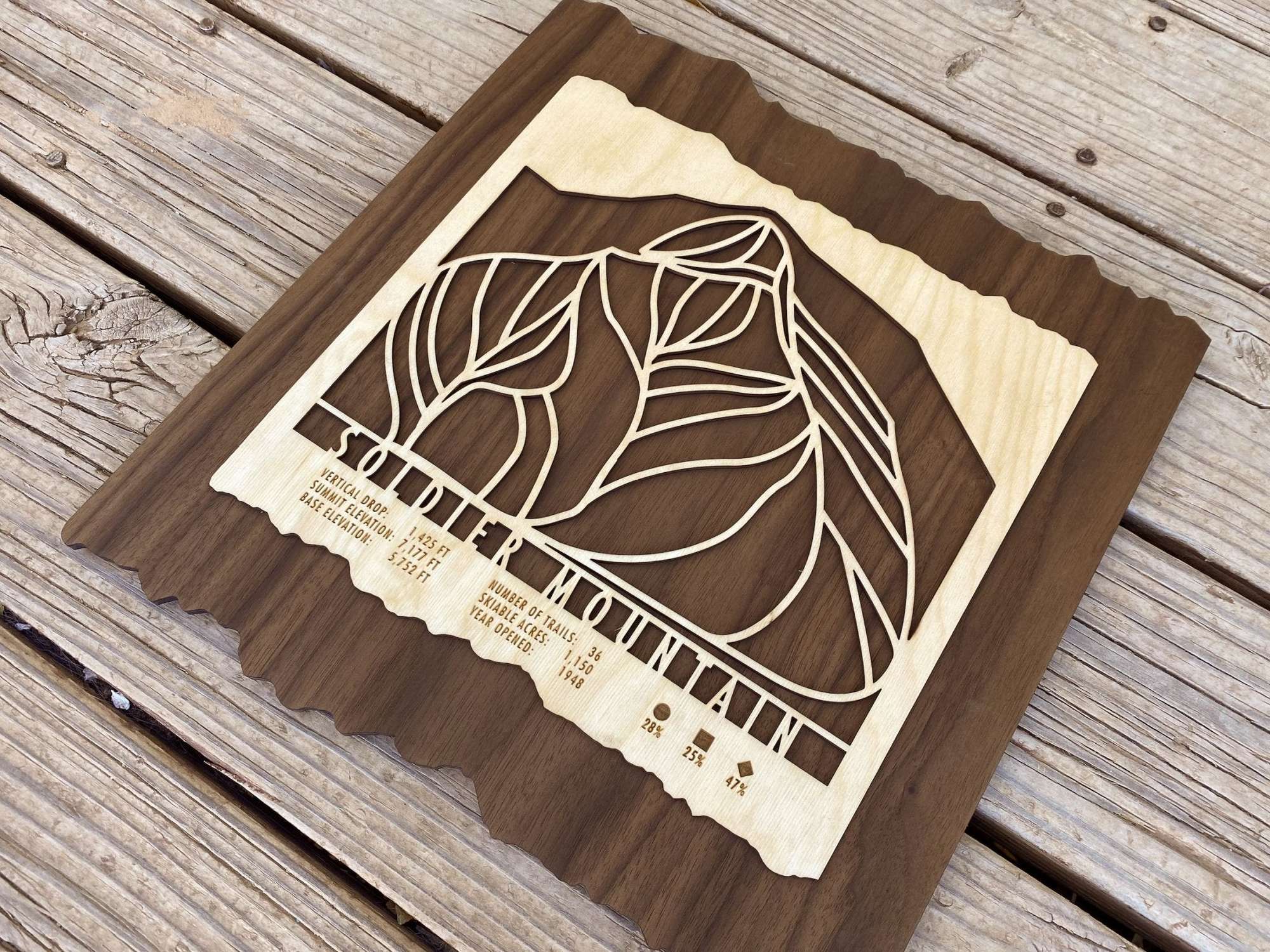 Angled view of Soldier Mountain Ski Trail Map wood artwork, showcasing layered wood design and detailed craftsmanship.