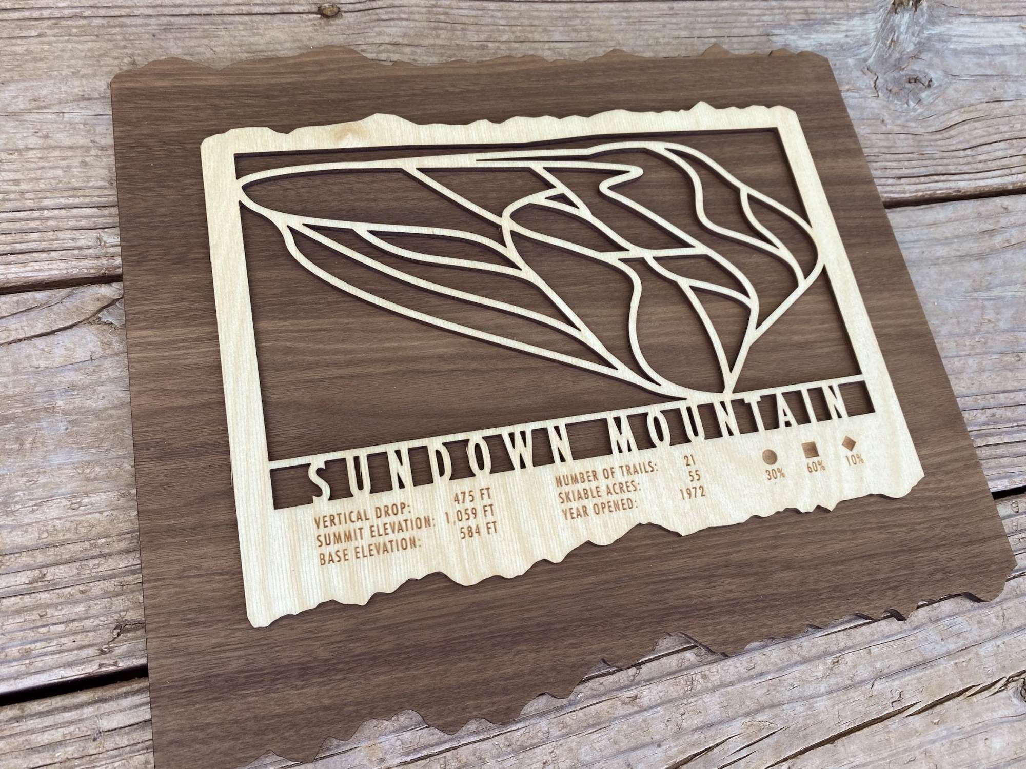 Wooden Sundown Mountain Ski Trail Map decor with engraved trail lines and resort stats, ideal ski gift or wall art for mountain homes.