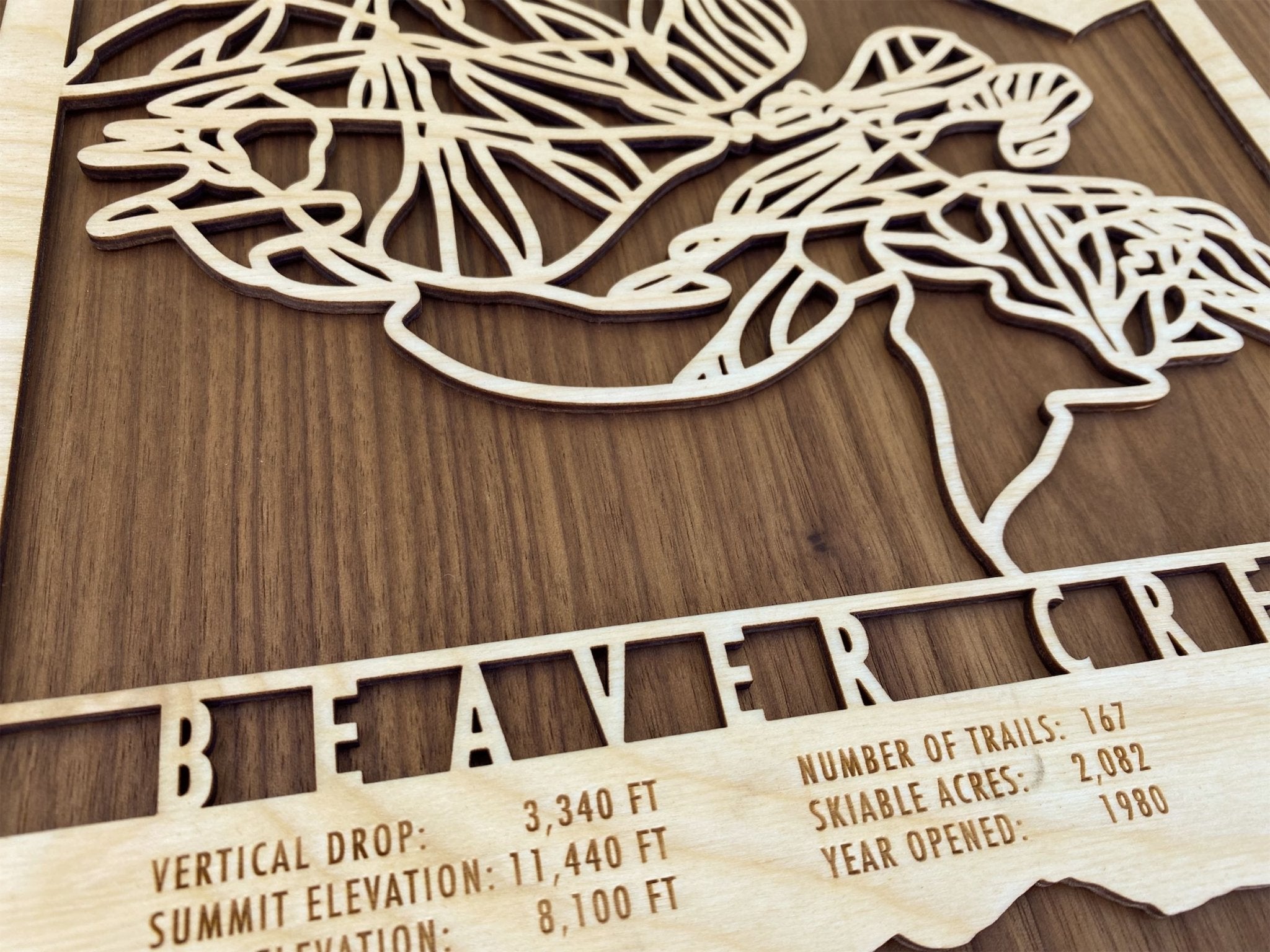 Detailed close-up of Beaver Creek Ski Trail Map - Wood Ski Decor showing engraved resort information and fine laser-cut trail lines.