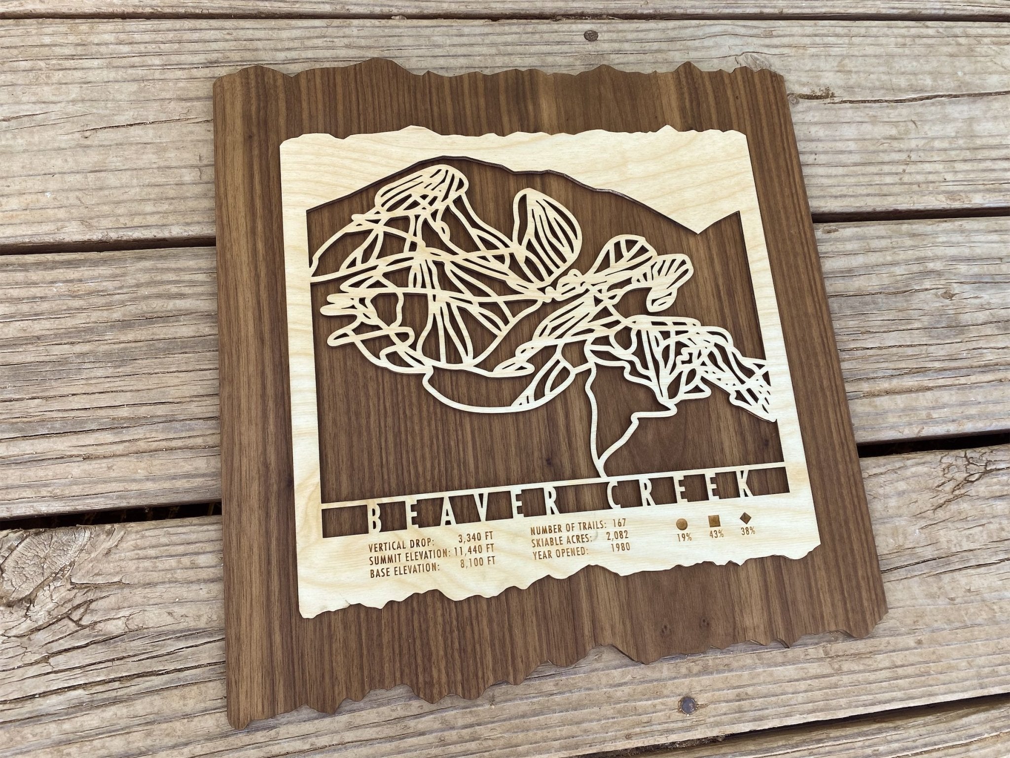 Angled view of Beaver Creek Ski Trail Map - Wood Ski Decor showing layered wood craftsmanship and intricate trail design, ideal for rustic home decor.