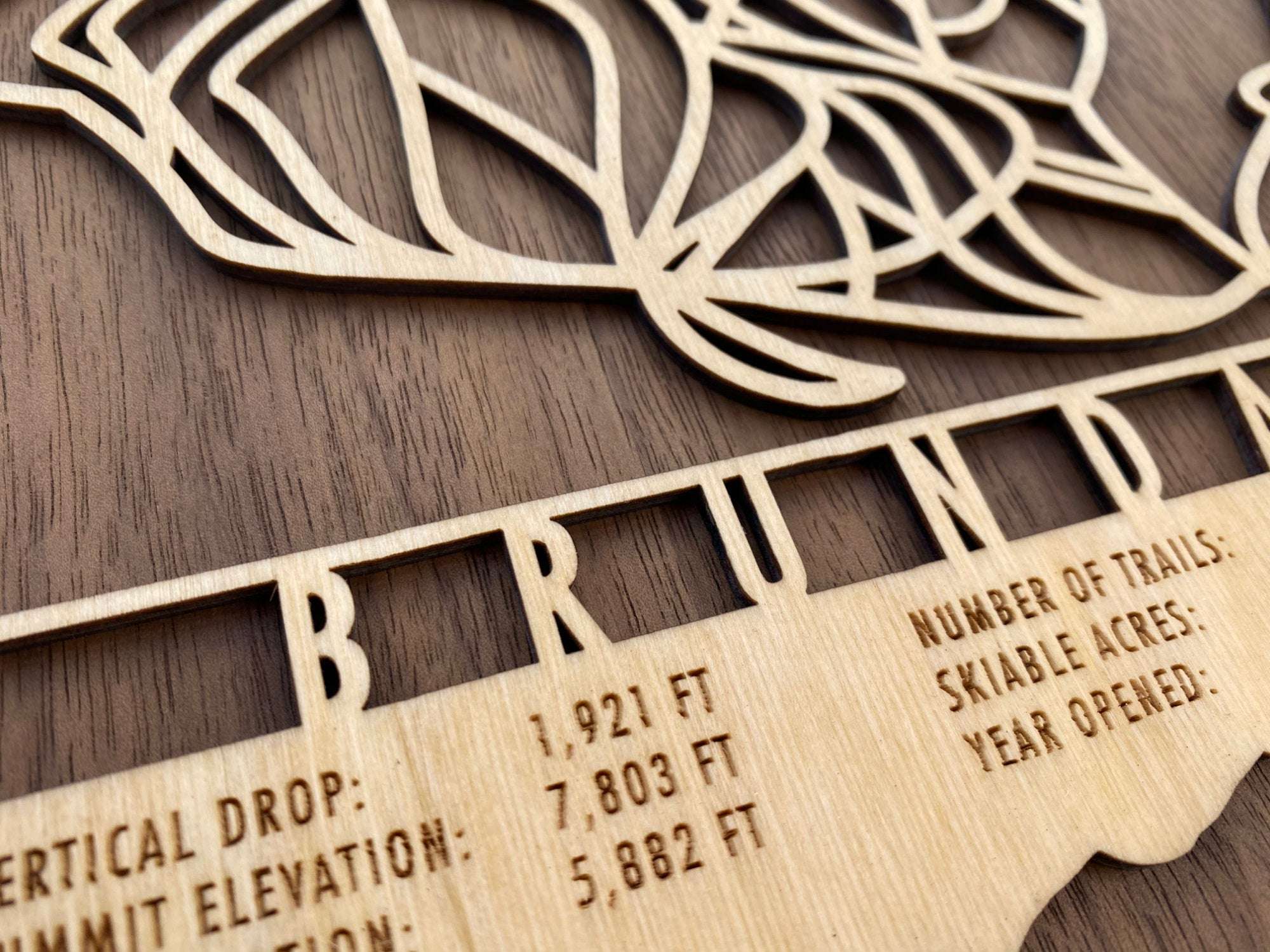 Close-up of Brundage Ski Trail Map showing precision laser engraving of mountain stats of this Idaho ski resort.