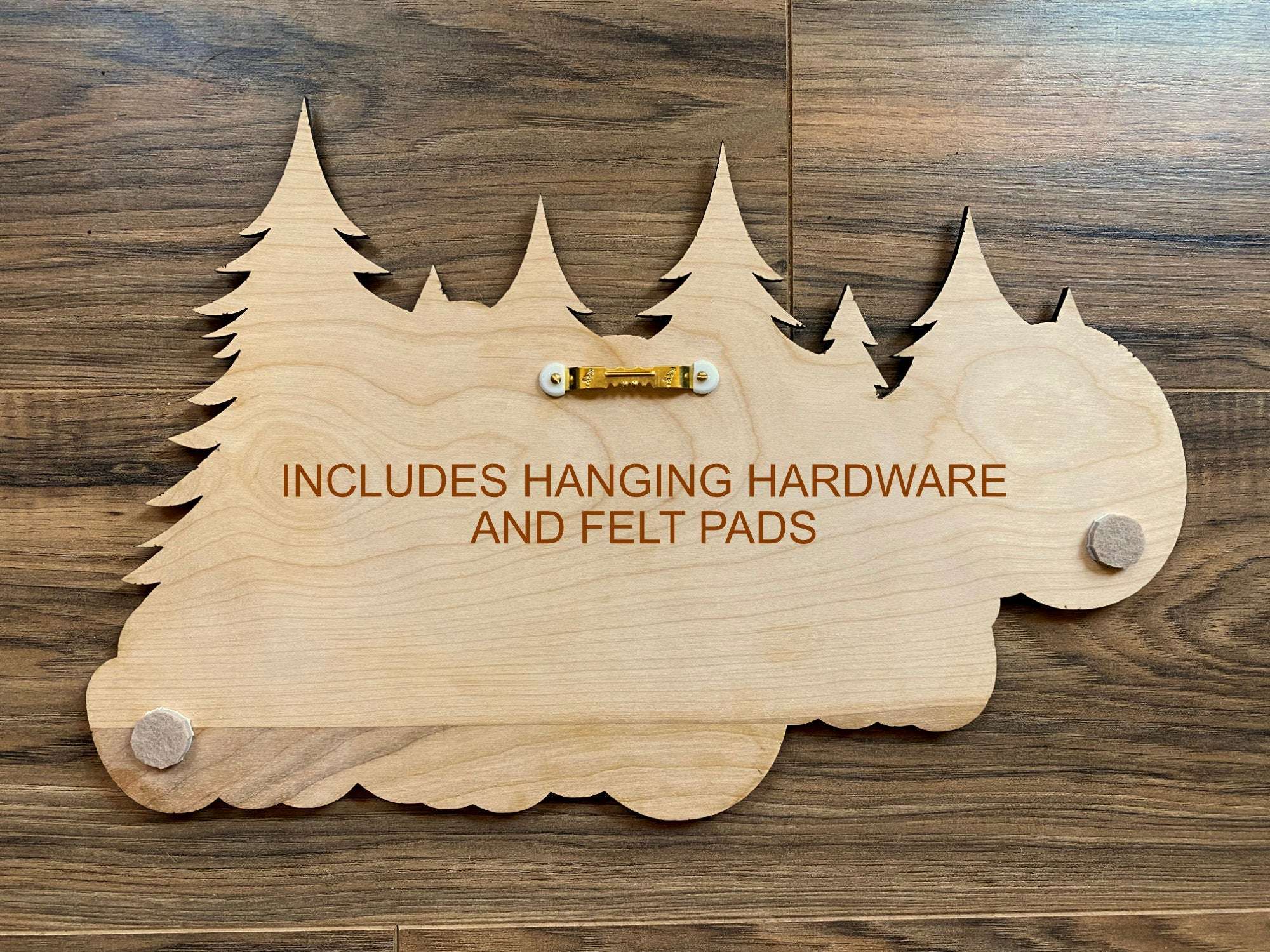Back of Cherish the Cabin wood sign with hanging hardware and felt pads, ready to mount in any cozy cabin or rustic space.