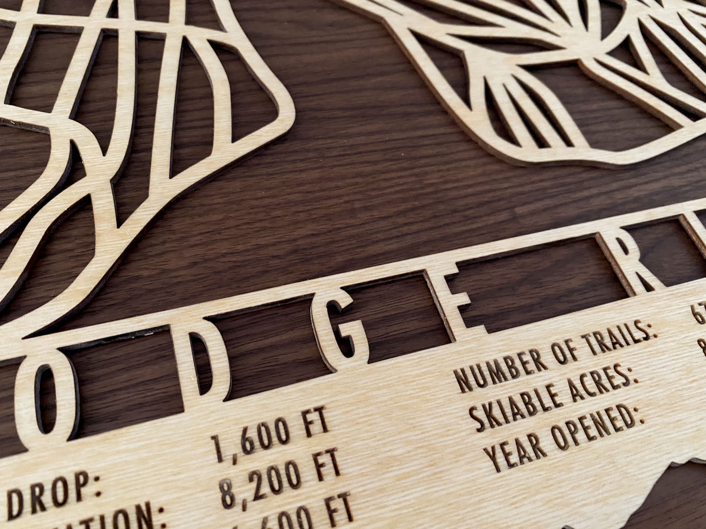 Close-up of Dodge Ridge Trail Map showing precision laser-cut lettering and trail details og this California ski area.