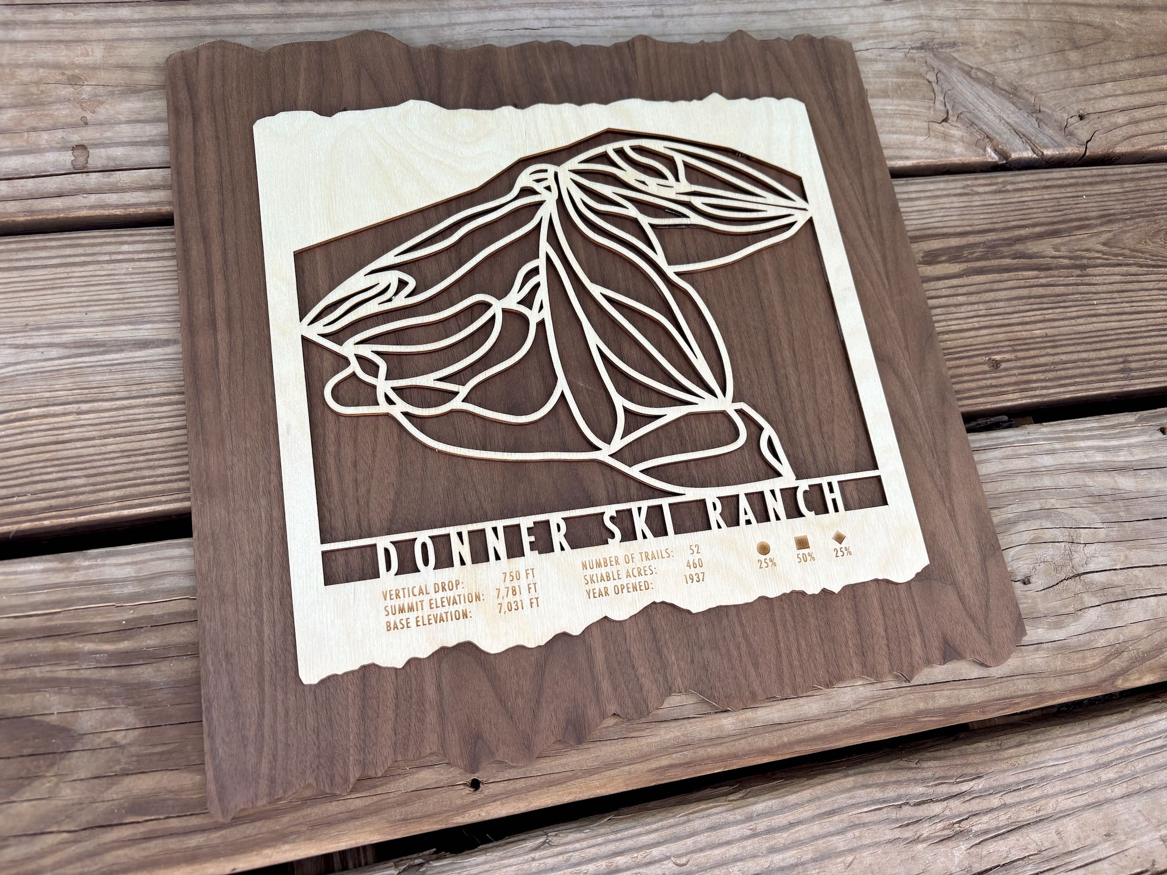 Angled view of Donner Ski Ranch Trail Map - Wood Ski Decor highlighting layered wood craftsmanship and mountain trail design.