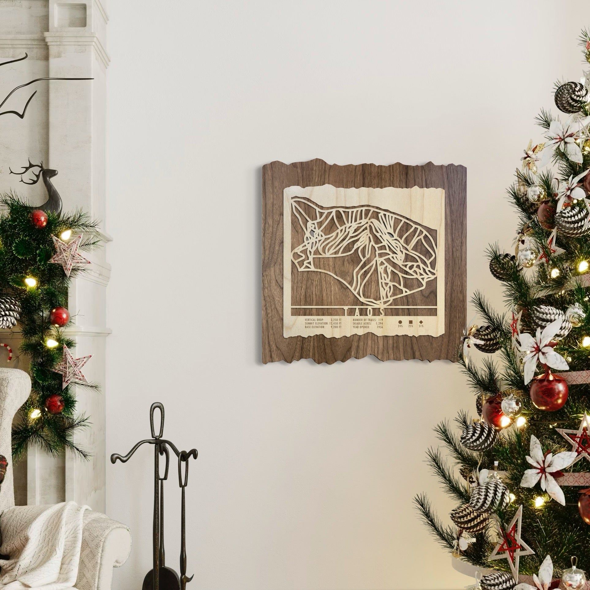 Taos New Mexico ski trail map hanging on wall near Christmas tree