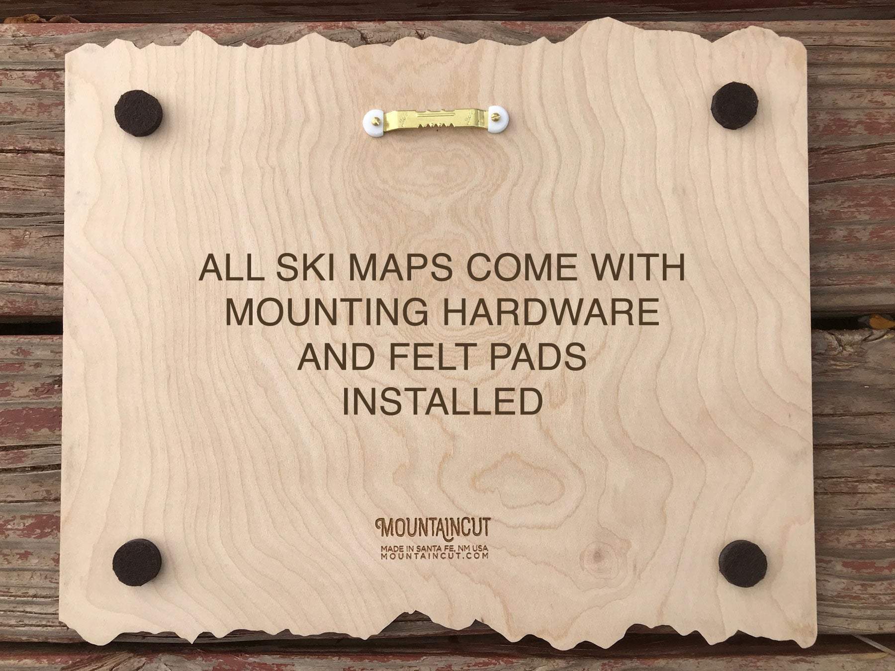 Back of Kissing Bridge Ski Trail Map showing pre-installed mounting hardware and felt pads, ready to hang for easy wall display.