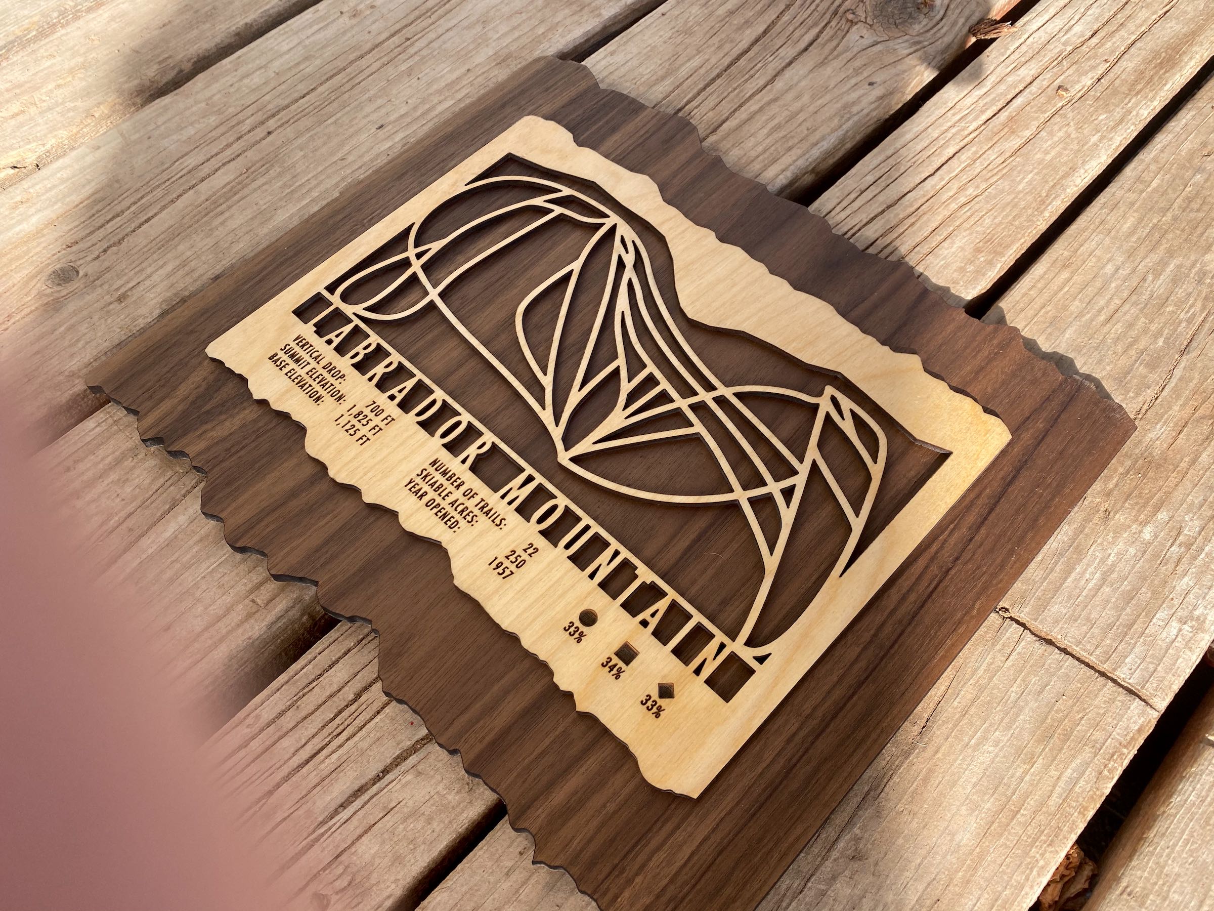 Labrador Mountain ski trail map in layered wood design with engraved trail lines and resort data of this New York ski area.
