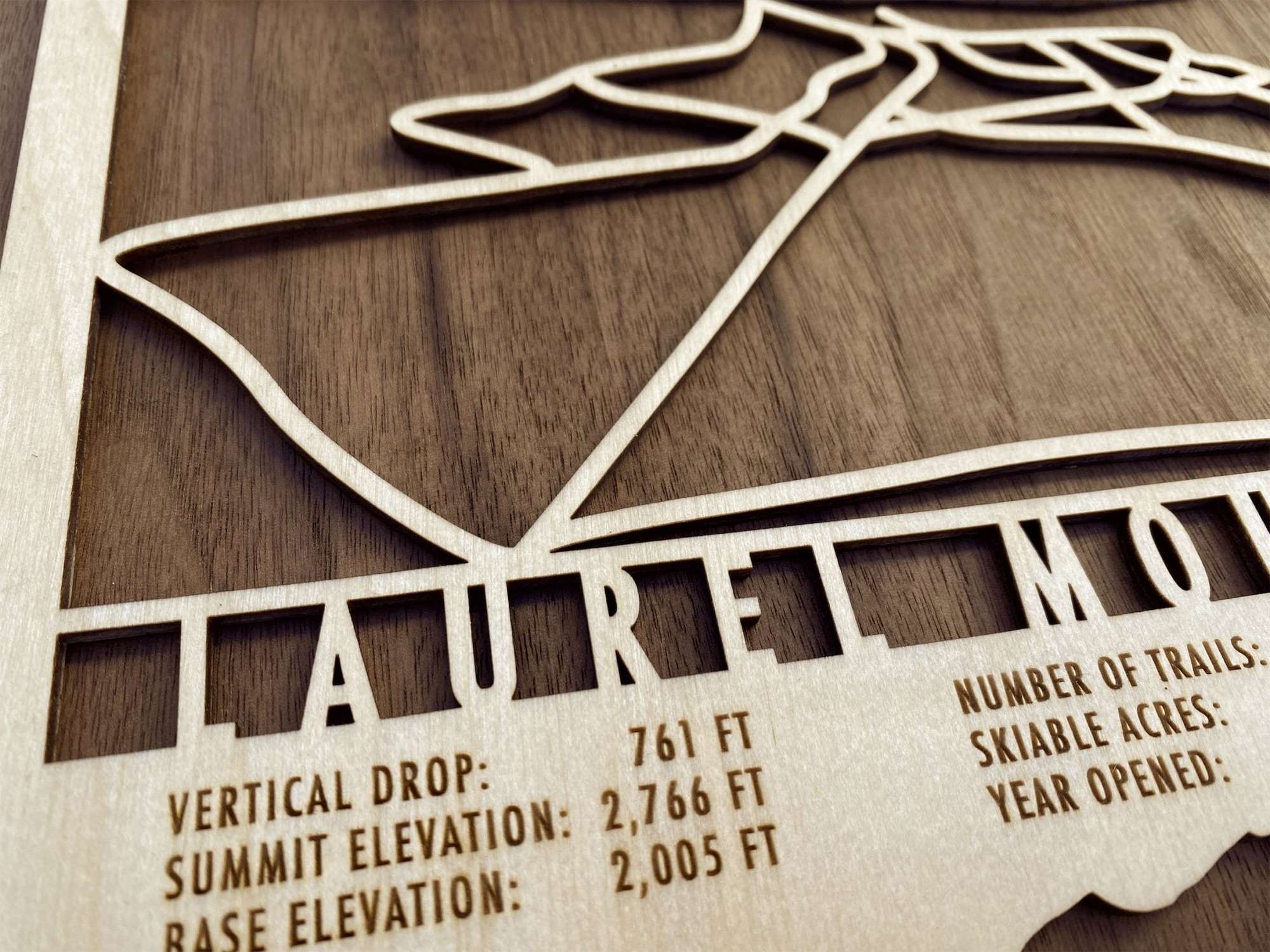 Zoomed-in section of Laurel Mountain Ski Trail Map - Wood Wall Decor highlighting precision laser engraving and trail layout, great for rustic interiors.