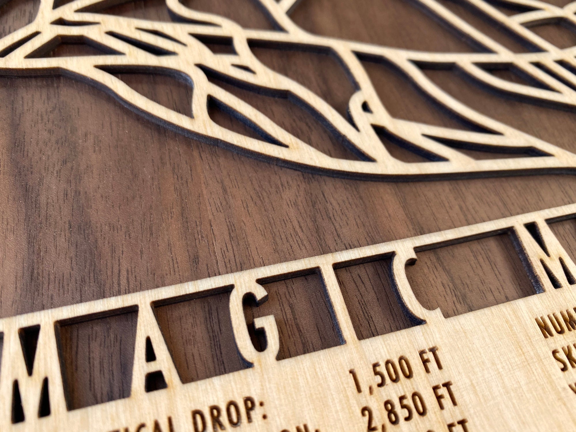 Detailed view of Magic Mountain Ski Trail Map - Wood Wall Decor showing precision laser engraving and natural wood grain texture.