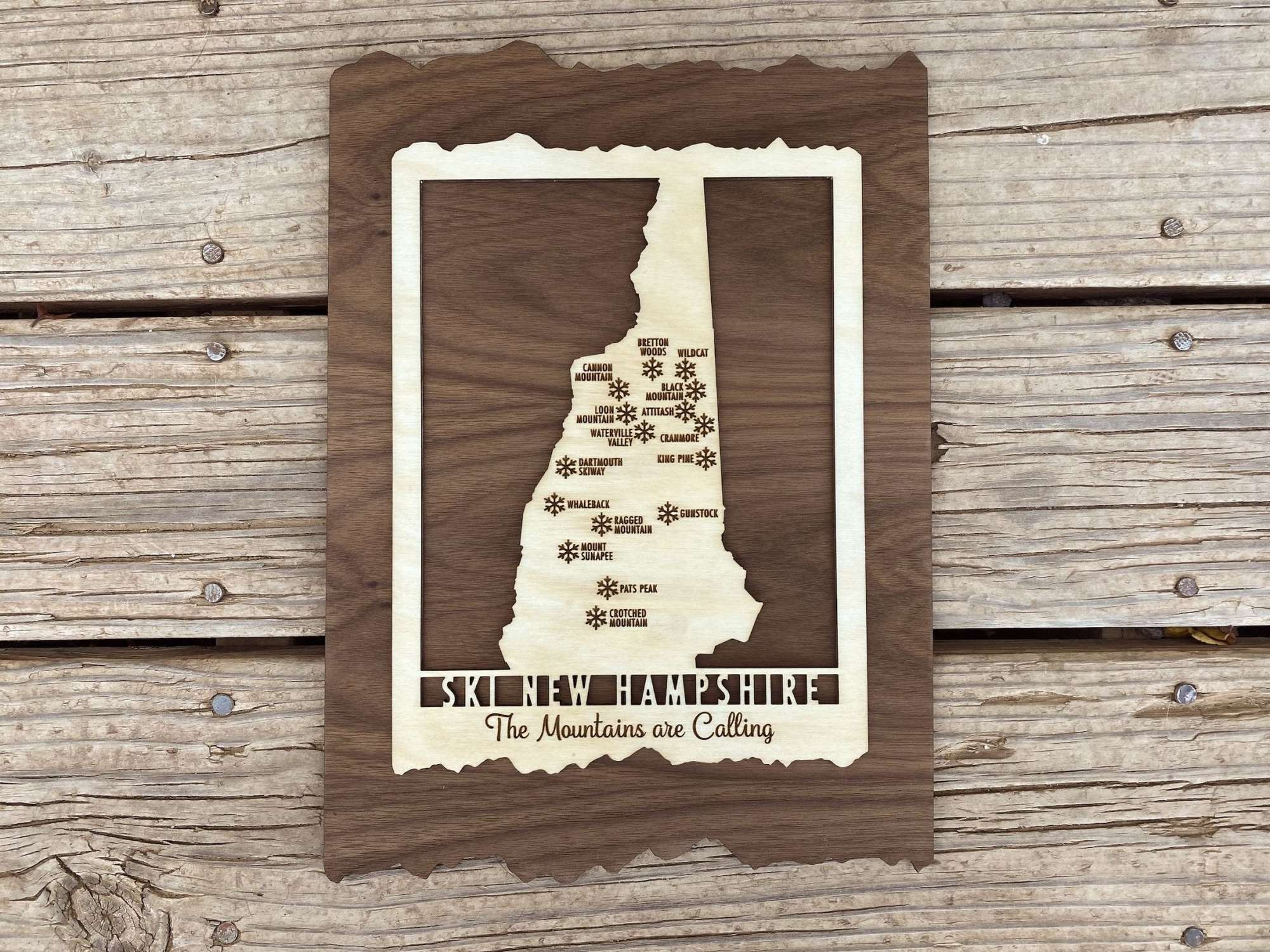 Top-down view of Ski New Hampshire Map - Wood Ski Decor - Mountaincut with engraved ski areas and rustic edge design, perfect for ski lodge decor.