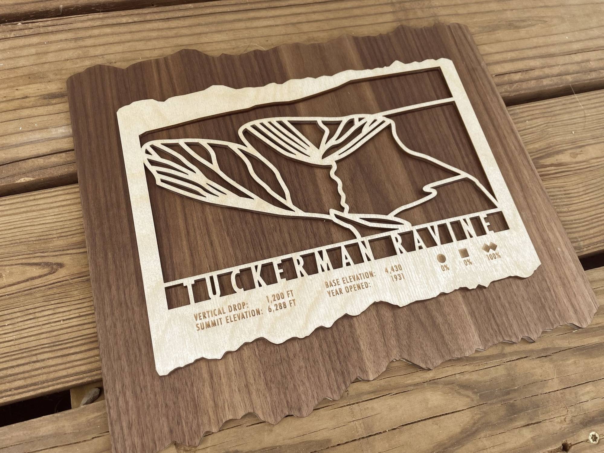 Angled view of Tuckerman Ravine Map - Wood Ski Decor highlighting layered wood craftsmanship and engraved ski trail details for home decor.