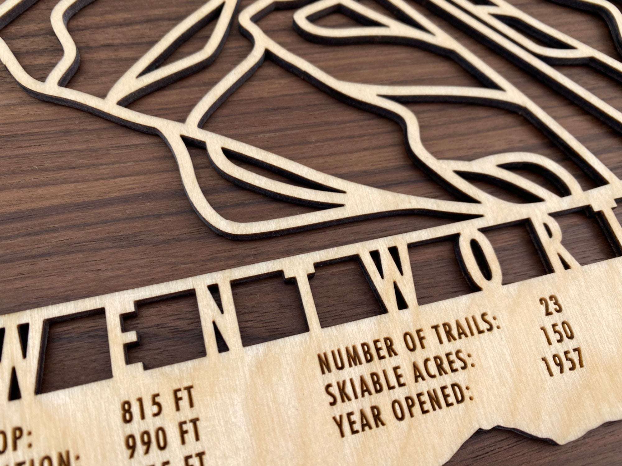 Close-up of Wentworth Wood Ski Trail Map highlighting engraved resort details and precision-cut trail lines.